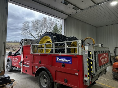 Hill Top Tire mobile truck departing with the back full of Goodyear farm tires and wheels for a customer located around Fort Plain, NY